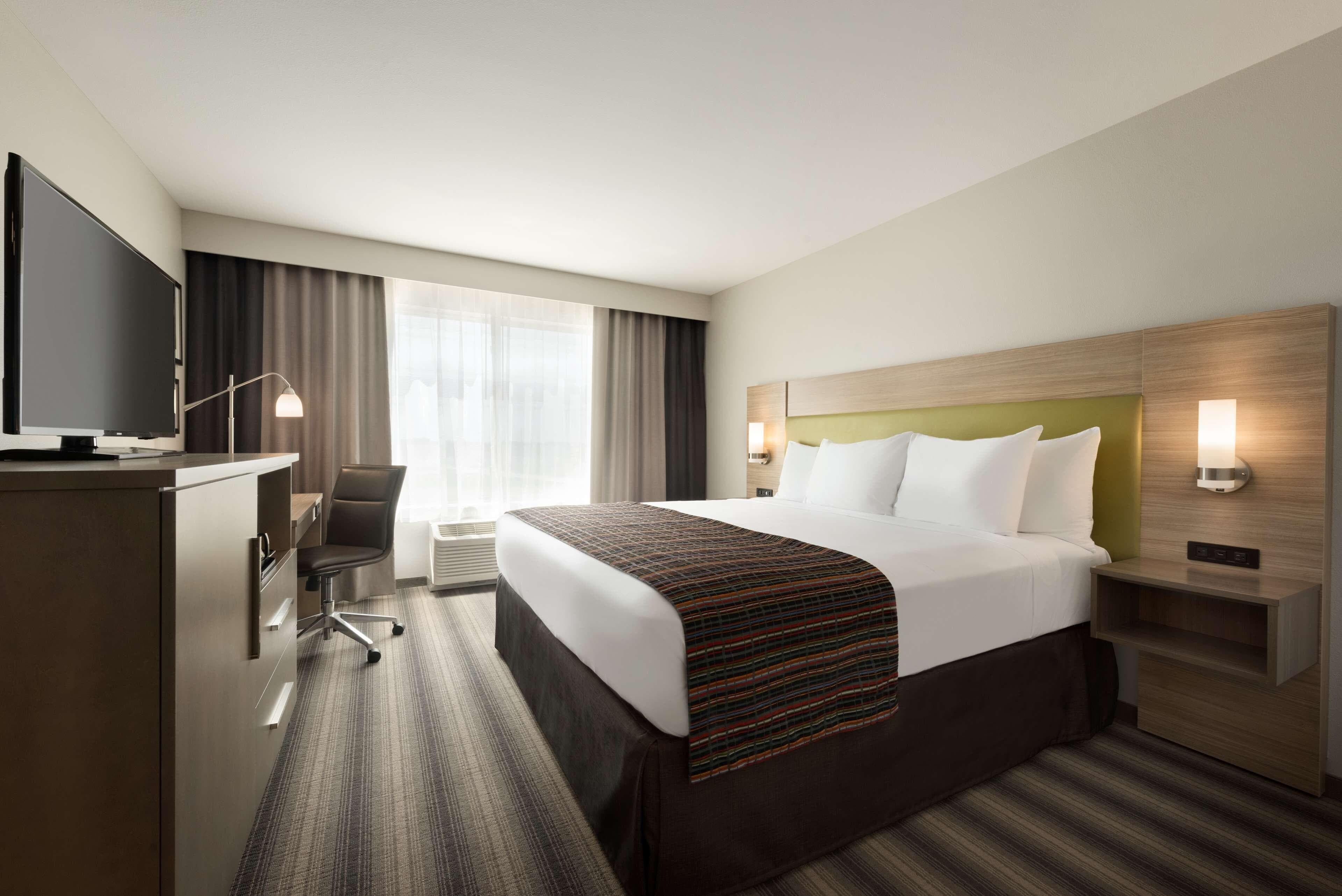 Country Inn & Suites by Radisson, Indianola, IA - Image 1