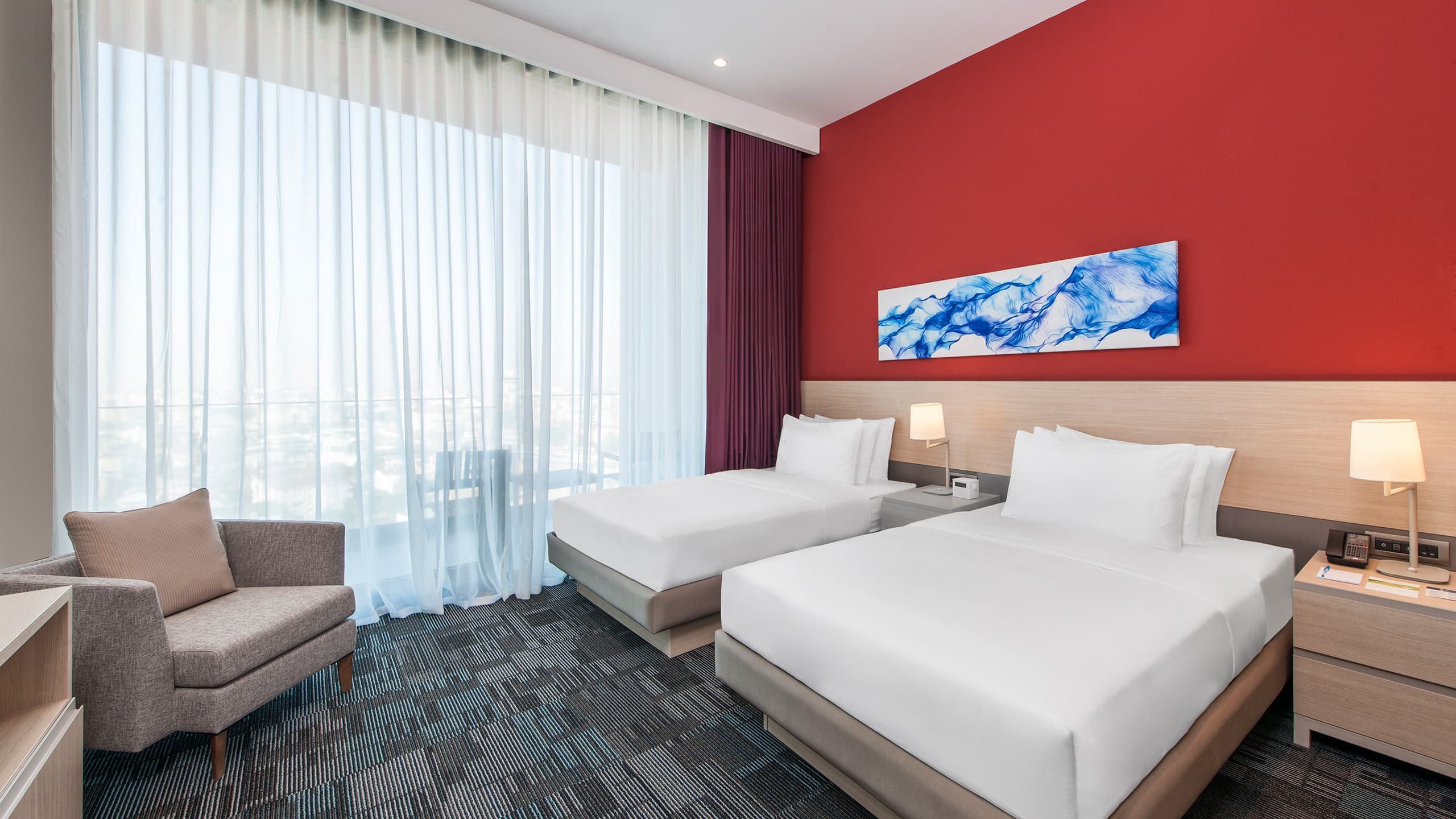 One Bedroom Suite with 2 Twin Beds a Kitchenette and a Sofabed - Image 2