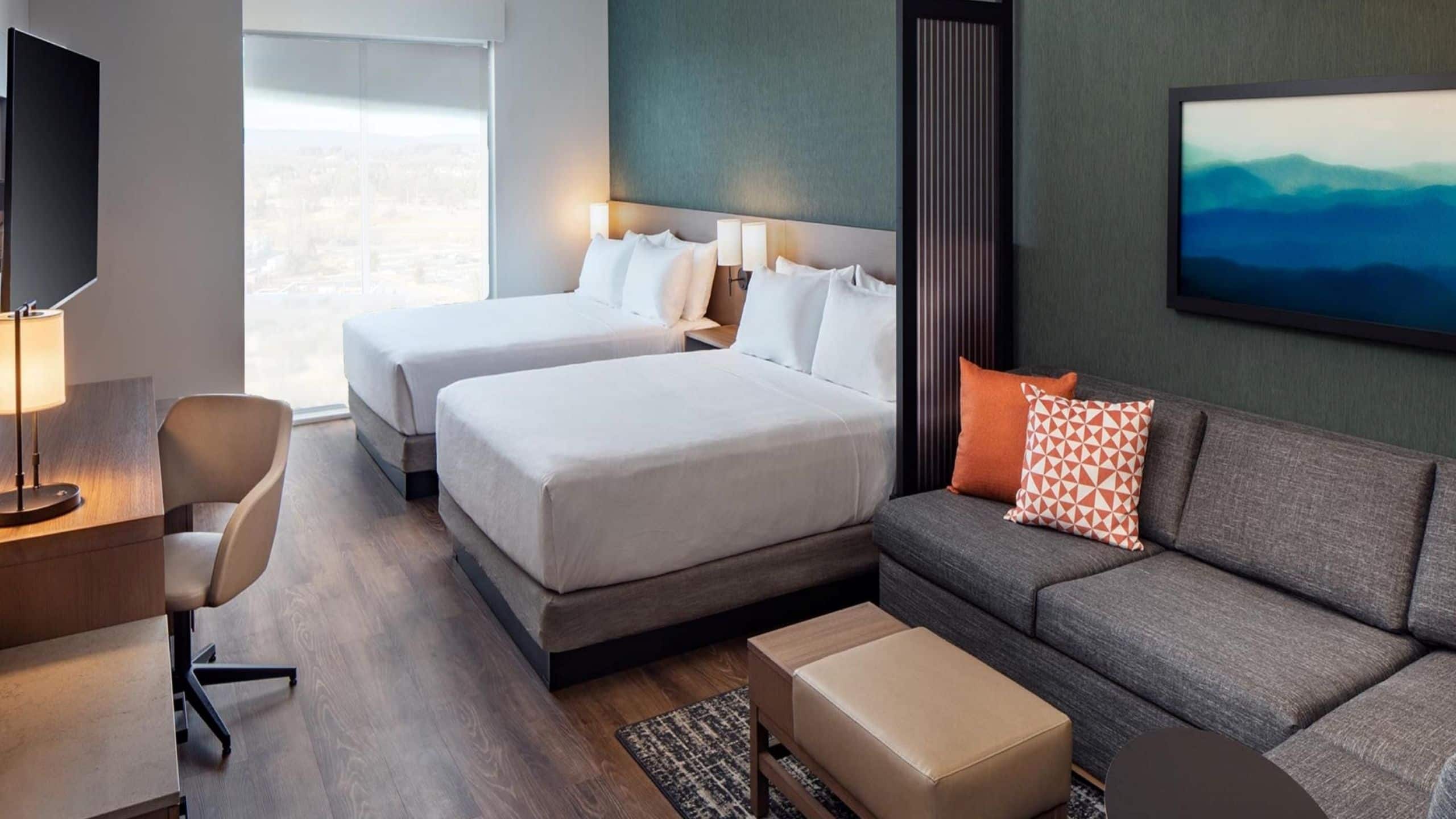 Two Queen Beds (Plus Sofa Bed) - Image 1