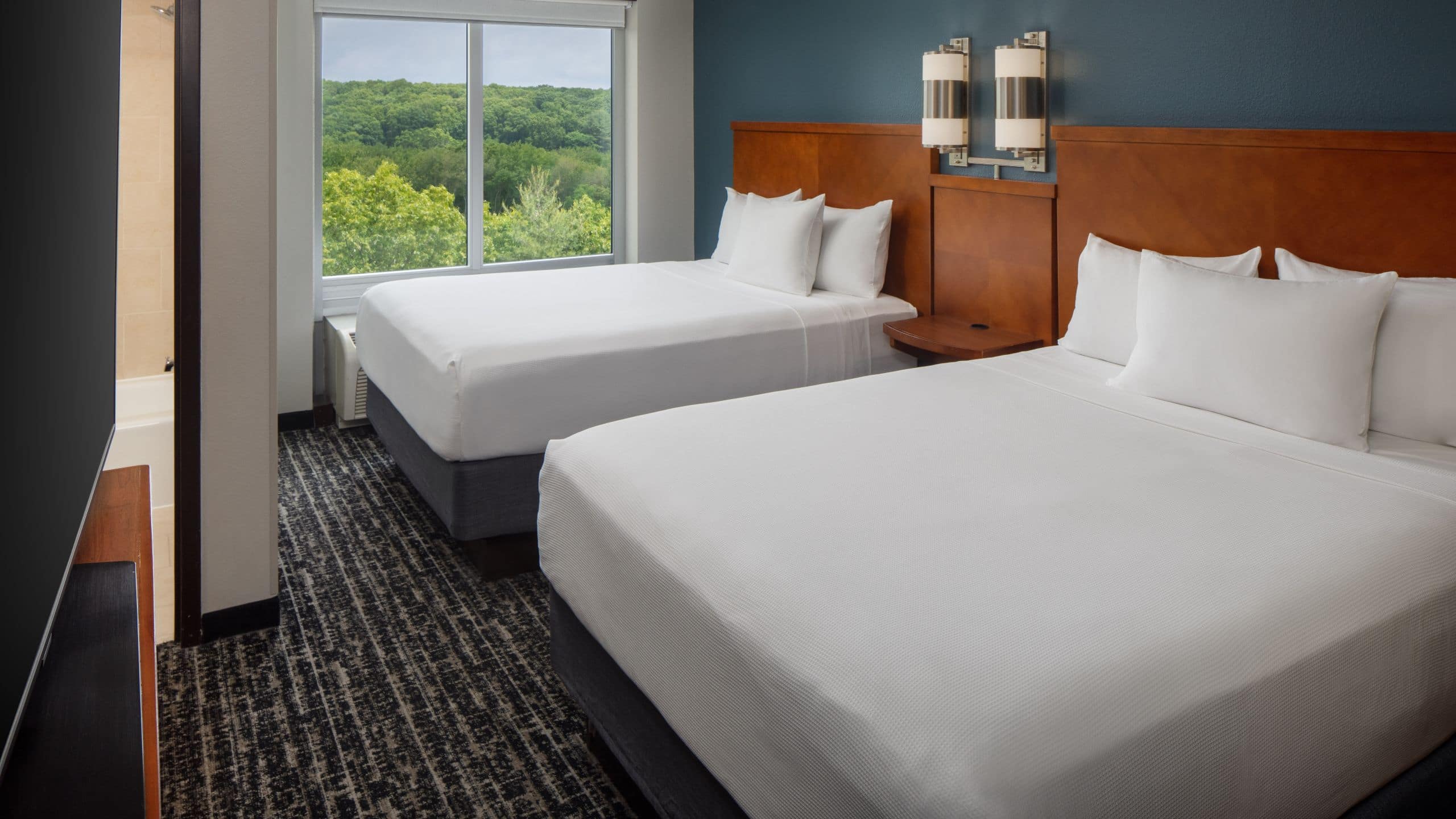 Two Queen Beds (with Sofa Bed) - Image 1