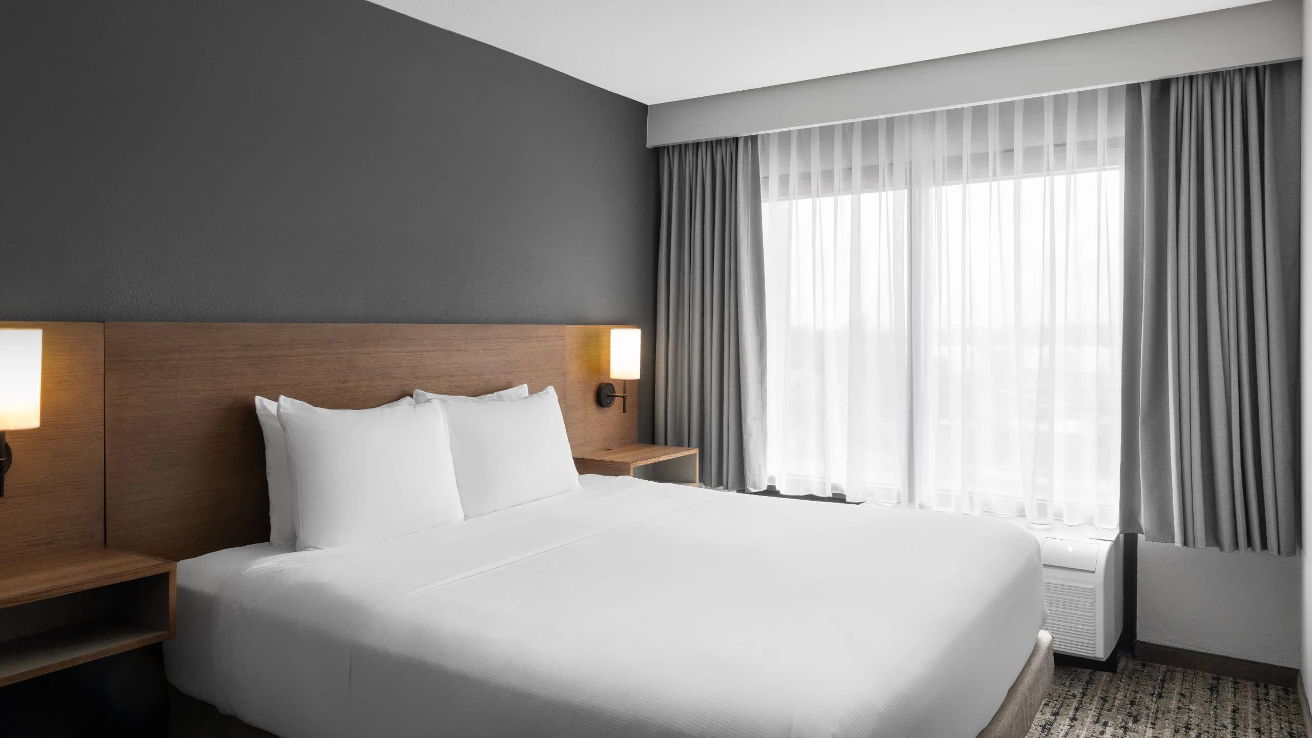 One King Bed (Plus Sleeper Sofa) - Image 1