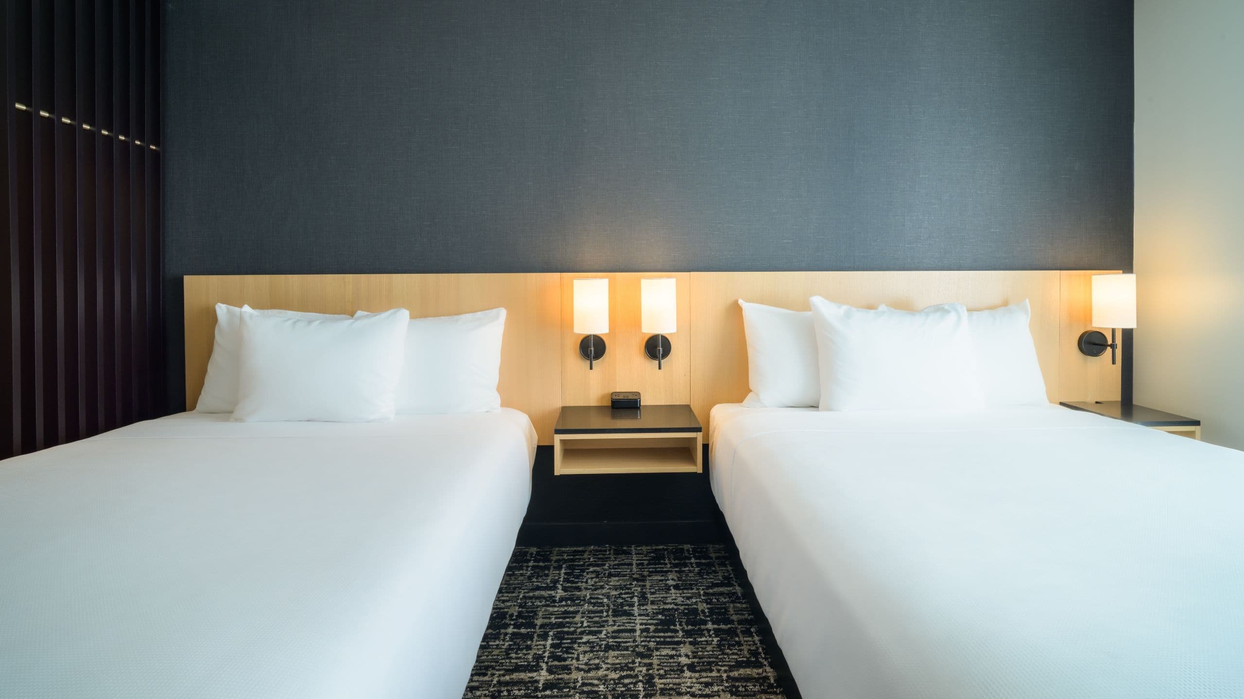 2 Queen Beds (with Sofa Bed) - Image 1