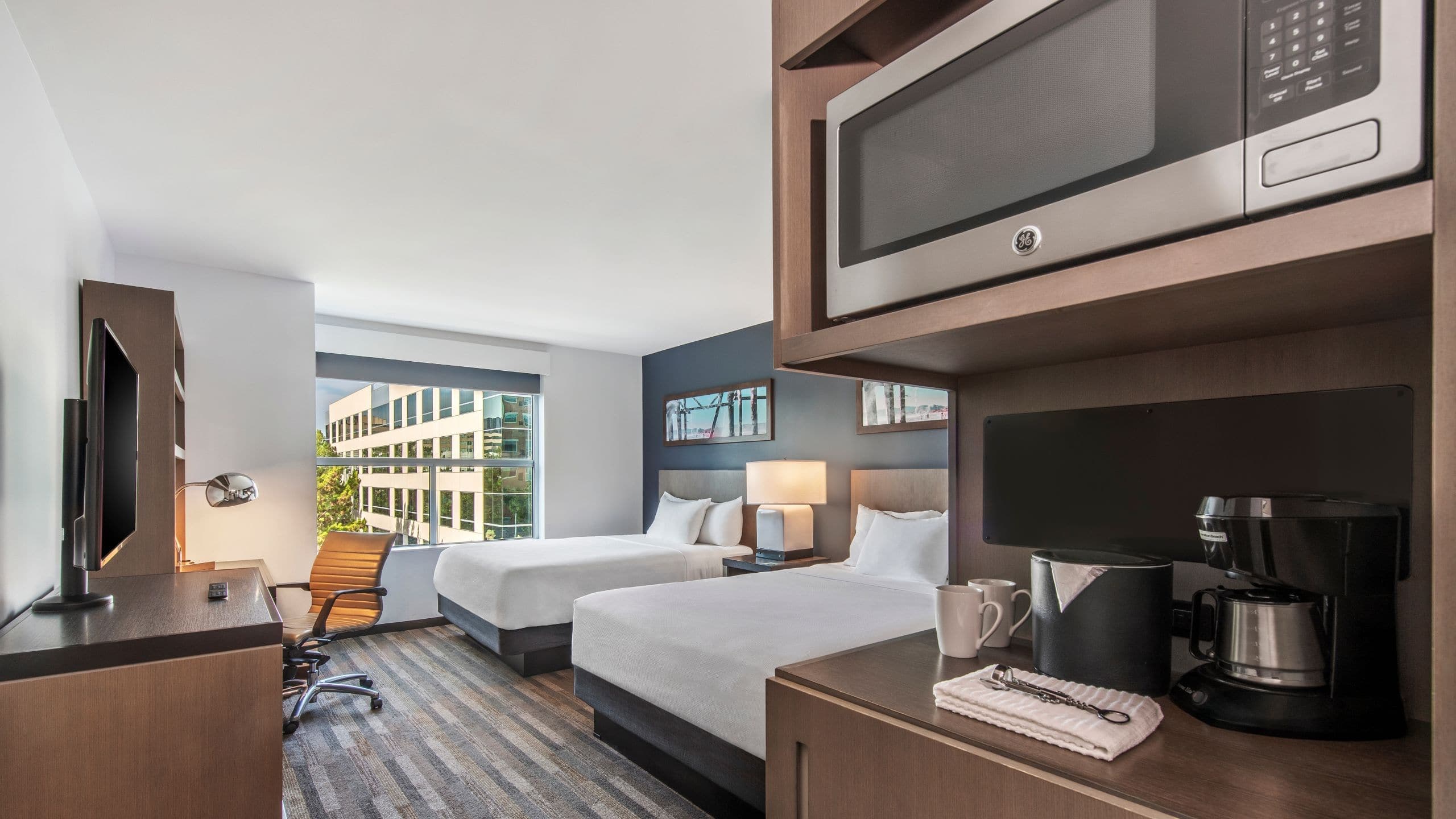 Den Guestroom | Two Queen Beds - Image 1